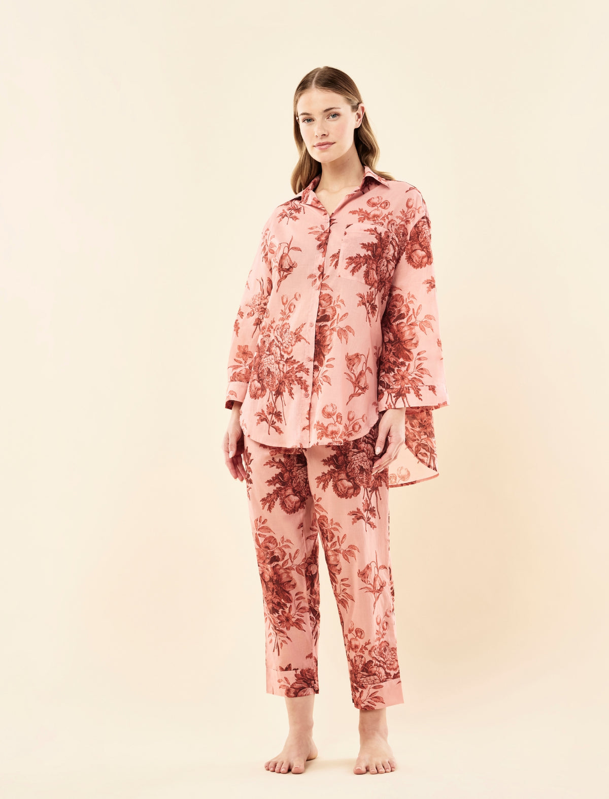 Sianie wearing the Karen Walker Romantic Floral Long Sleeve Crop PJ Set
[model: Sianie wears size S |  Height: 175m
/ 5’9” | Bust: 85cm | Waist: 66cm| Hips: 93cm]
