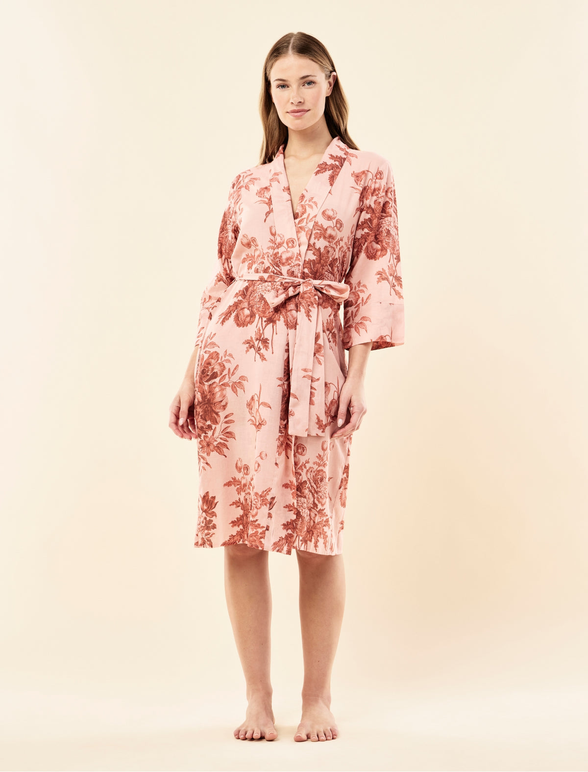Sianie wearing the Karen Walker Romantic Floral Midi Robe
[model: Sianie wears size S |  Height: 175m
/ 5’9” | Bust: 85cm | Waist: 66cm| Hips: 93cm]